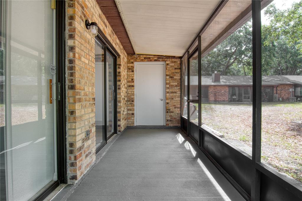 1831 Foxhall Circle Kissimmee, FL 34741 - Photo 7 of 16 a view of a porch with a porch