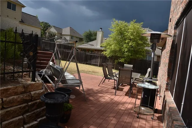 a view of a house with sitting area and furniture