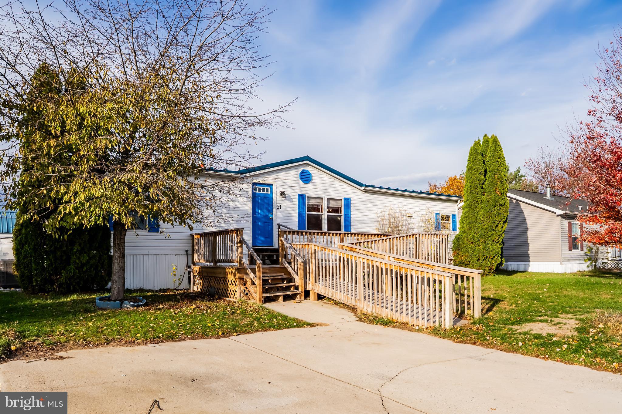 21 Hidden Noll Road Carlisle, PA 17013 - Photo 1 of 25 a view of a house with a yard and fence