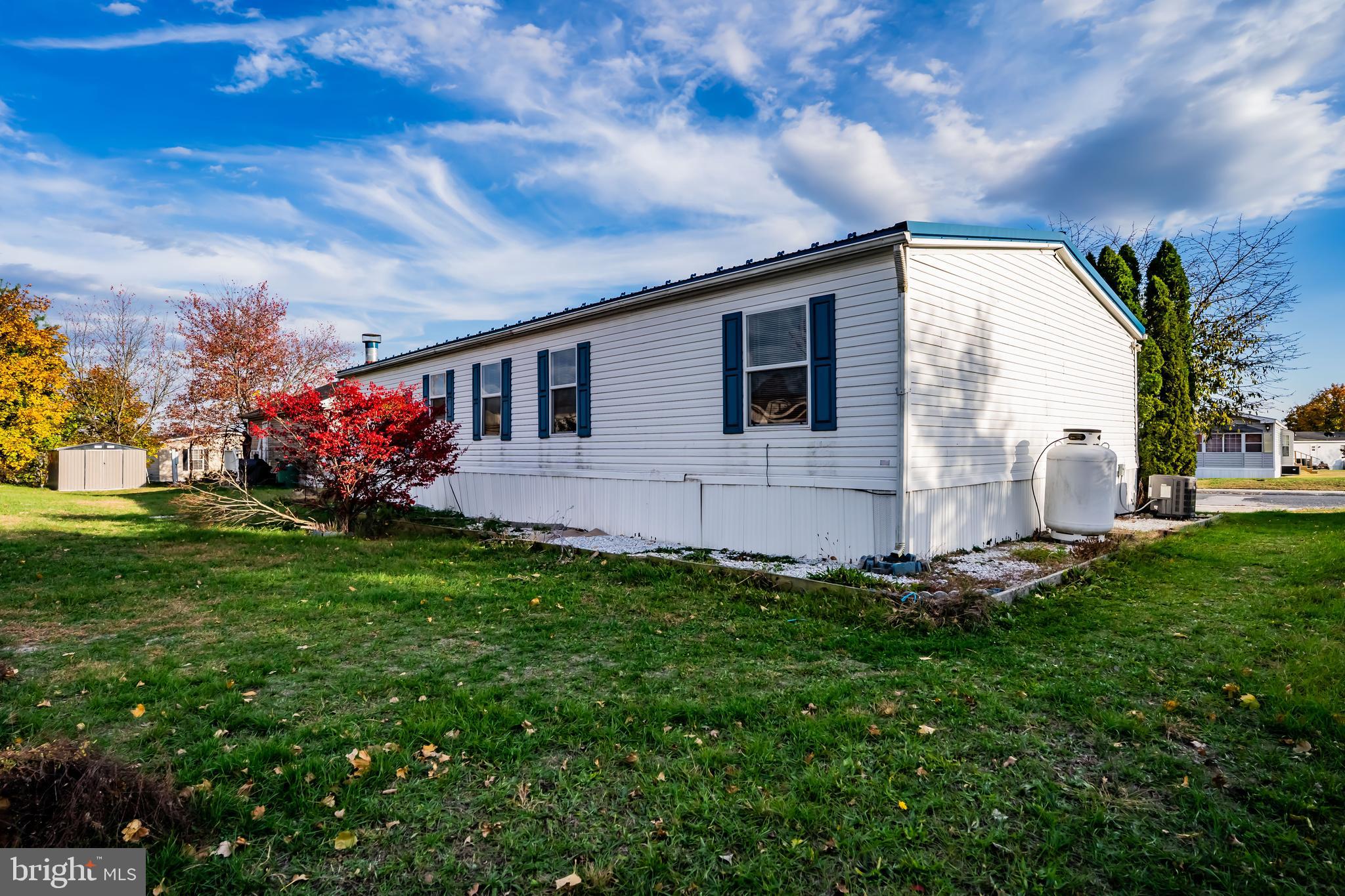 21 Hidden Noll Road Carlisle, PA 17013 - Photo 22 of 25 a front view of house with yard and outdoor seating