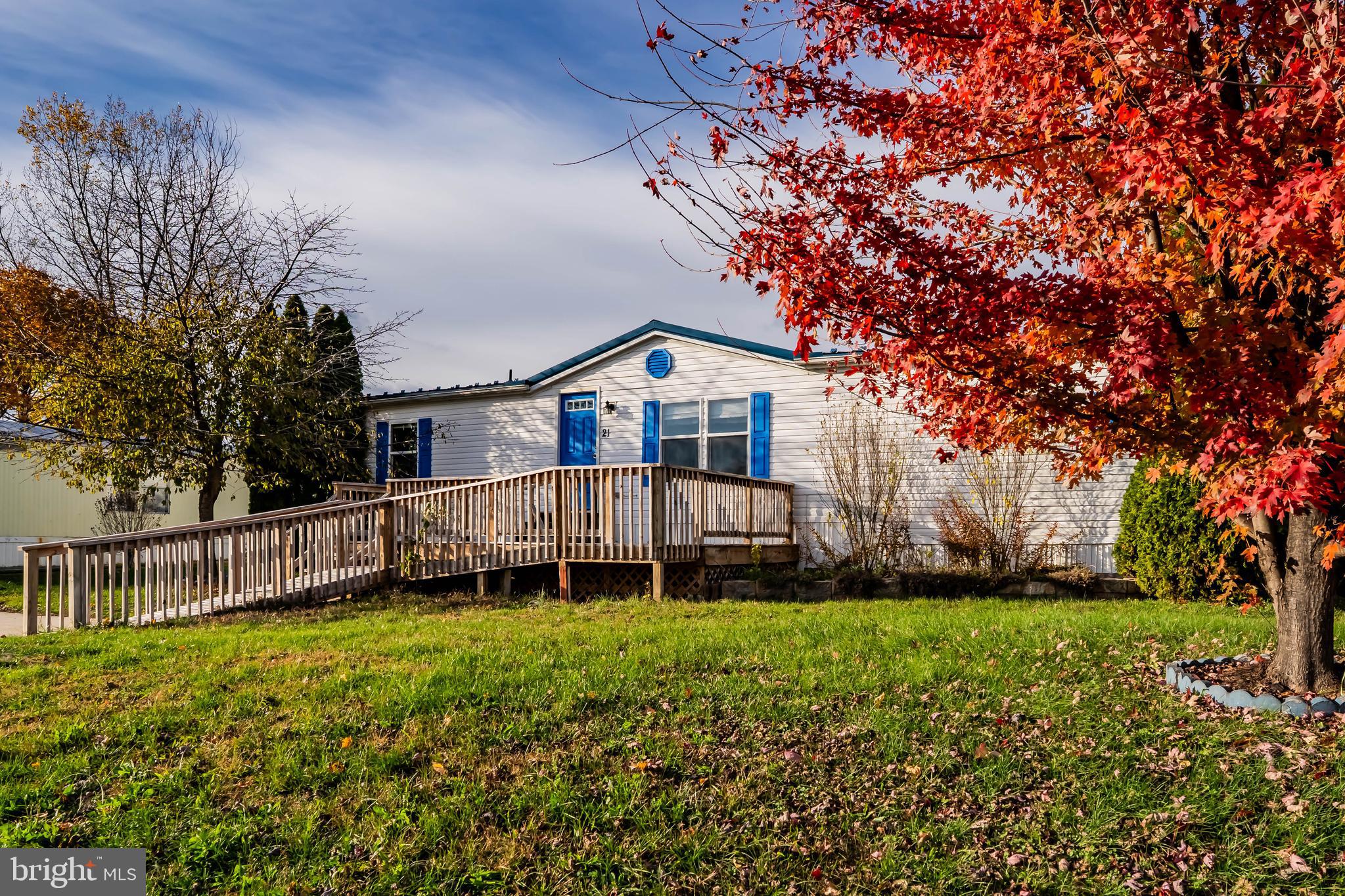 21 Hidden Noll Road Carlisle, PA 17013 - Photo 23 of 25 a front view of a house with a yard