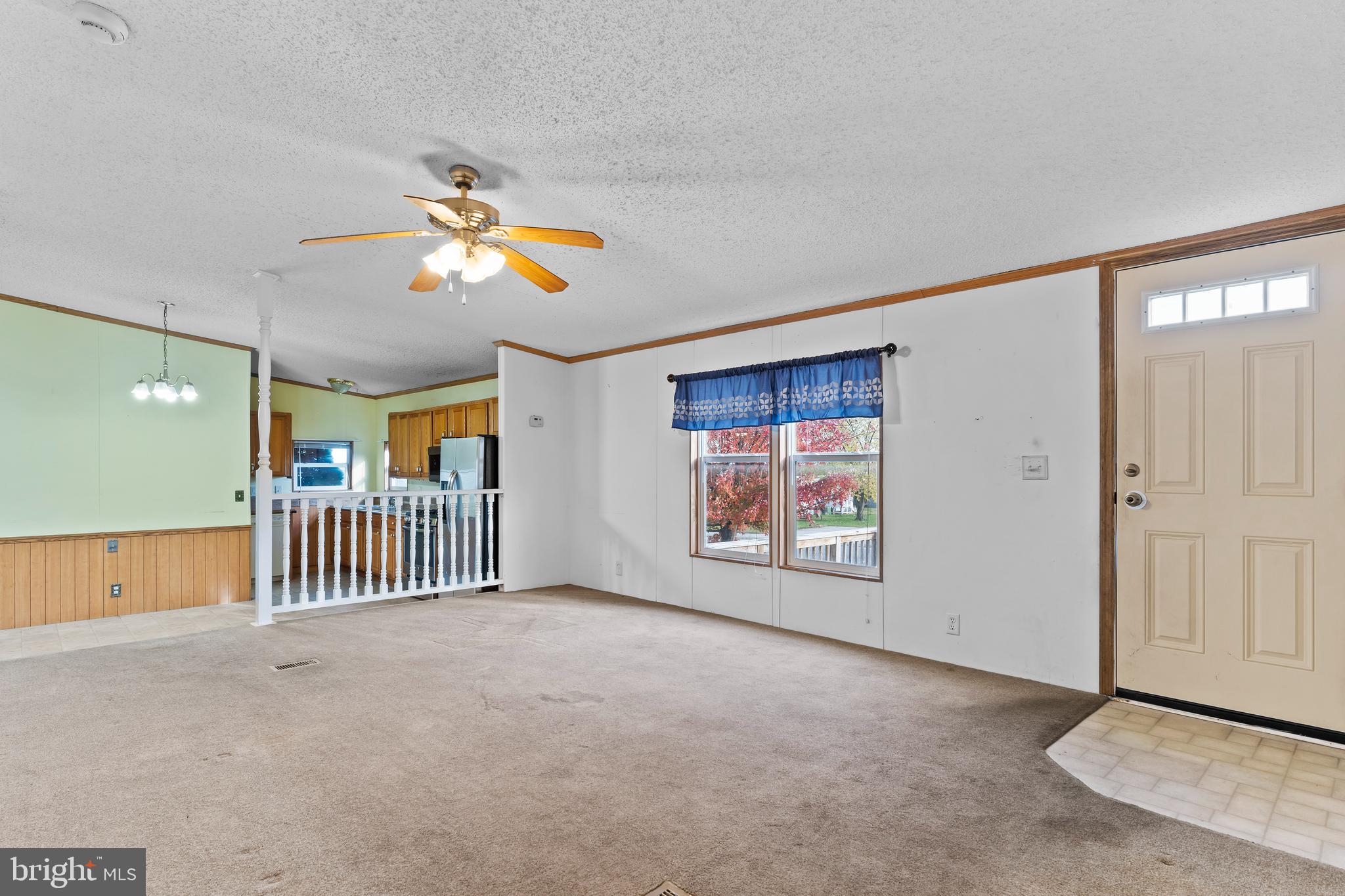 21 Hidden Noll Road Carlisle, PA 17013 - Photo 4 of 25 a view of a livingroom with a ceiling fan and window
