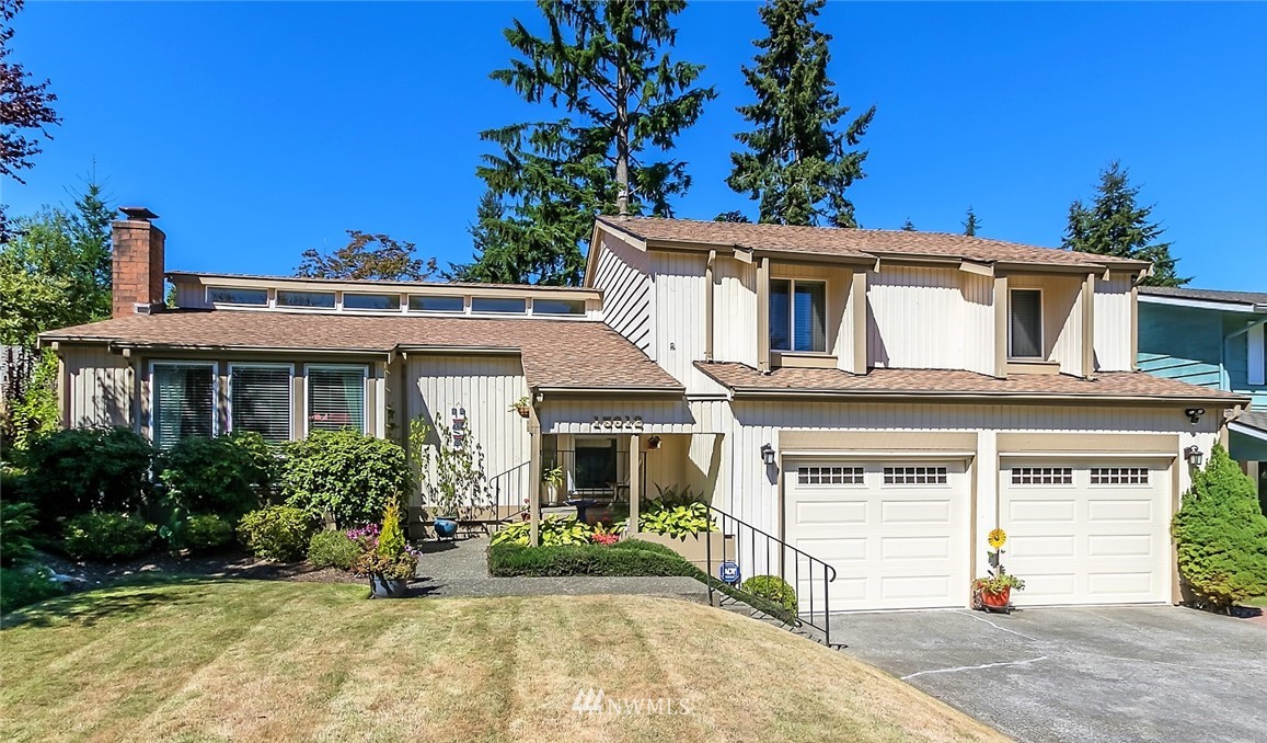 15612 Southeast 178th Street Renton, WA 98058 - Photo 1 of 40 front view of a house with a porch