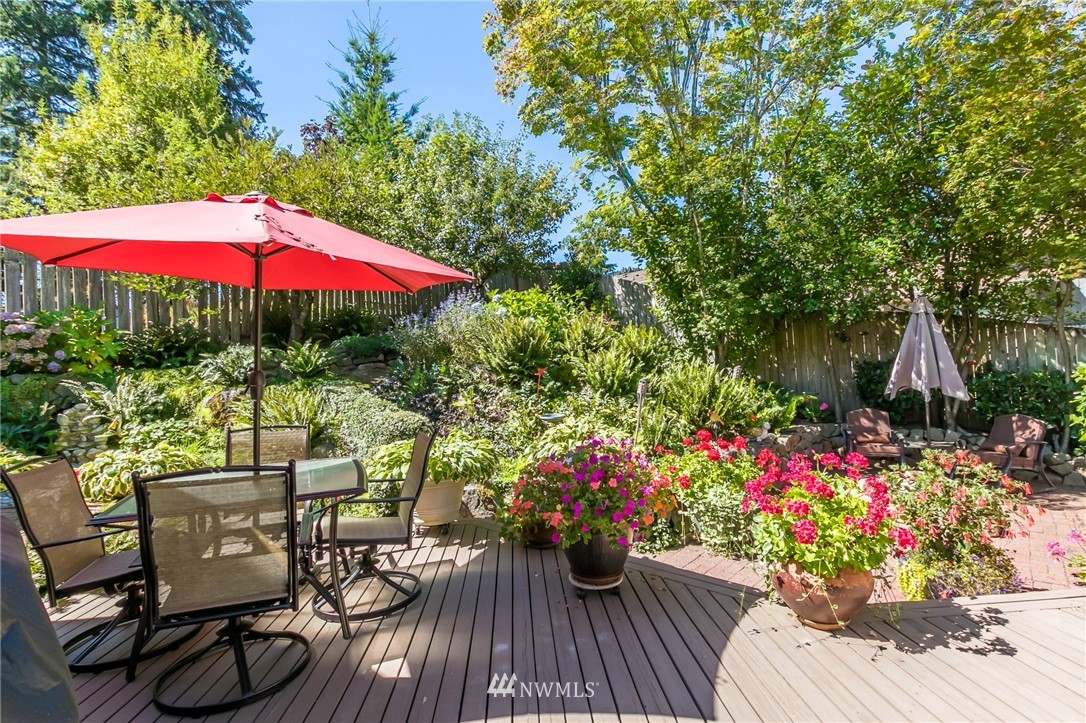 15612 Southeast 178th Street Renton, WA 98058 - Photo 12 of 40 a view of a patio with furniture and flowers