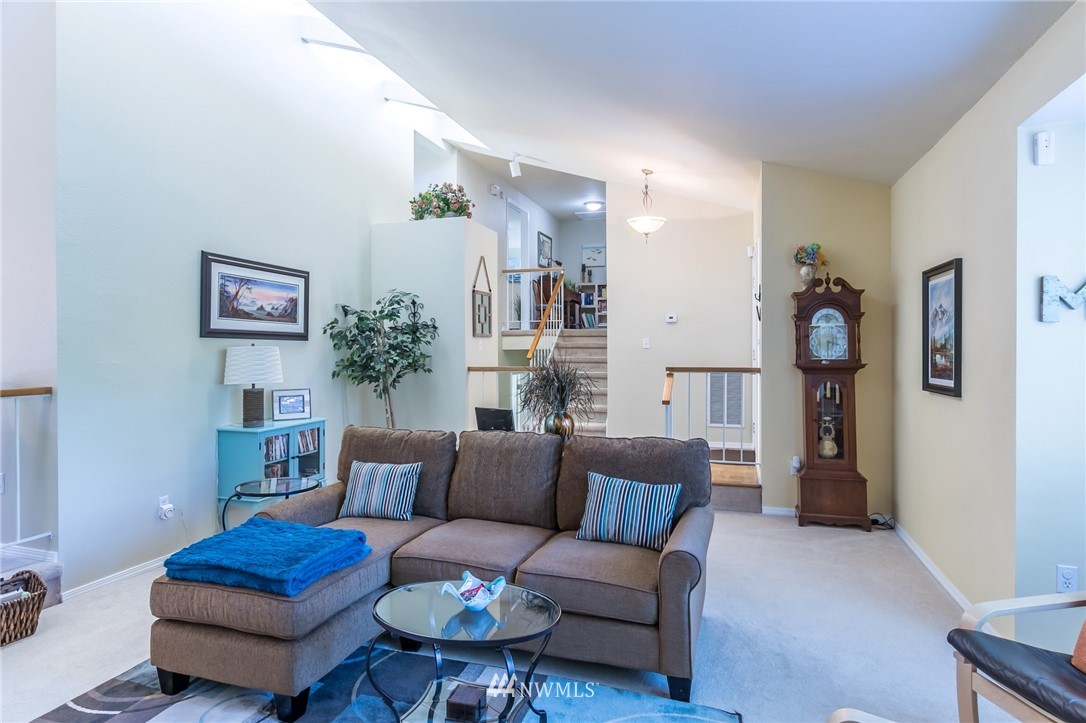 15612 Southeast 178th Street Renton, WA 98058 - Photo 18 of 40 a living room with furniture and a potted plant