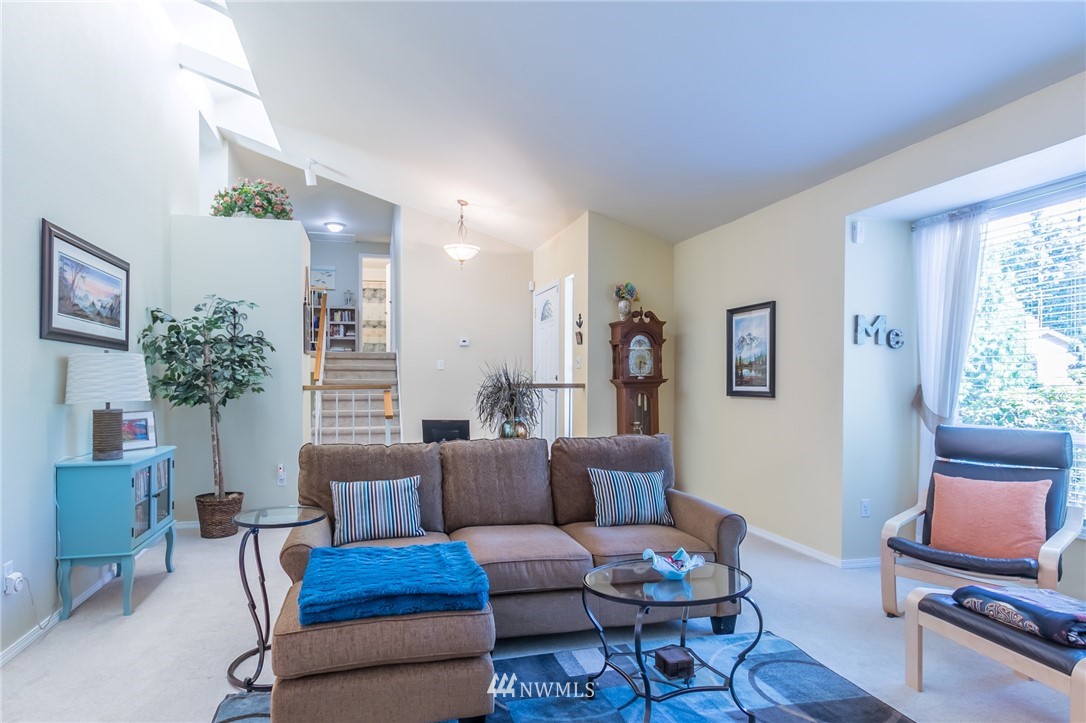 15612 Southeast 178th Street Renton, WA 98058 - Photo 19 of 40 a living room with furniture and a potted plant