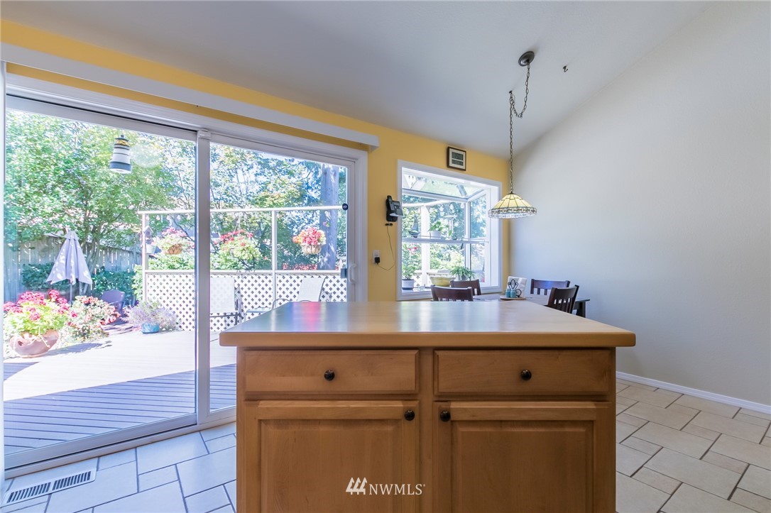 15612 Southeast 178th Street Renton, WA 98058 - Photo 26 of 40 a view of a room with a window and wooden floor