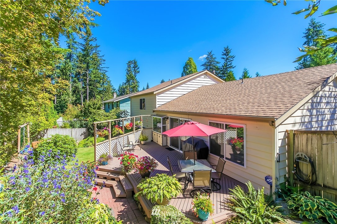 15612 Southeast 178th Street Renton, WA 98058 - Photo 4 of 40 an outdoor space with seating
