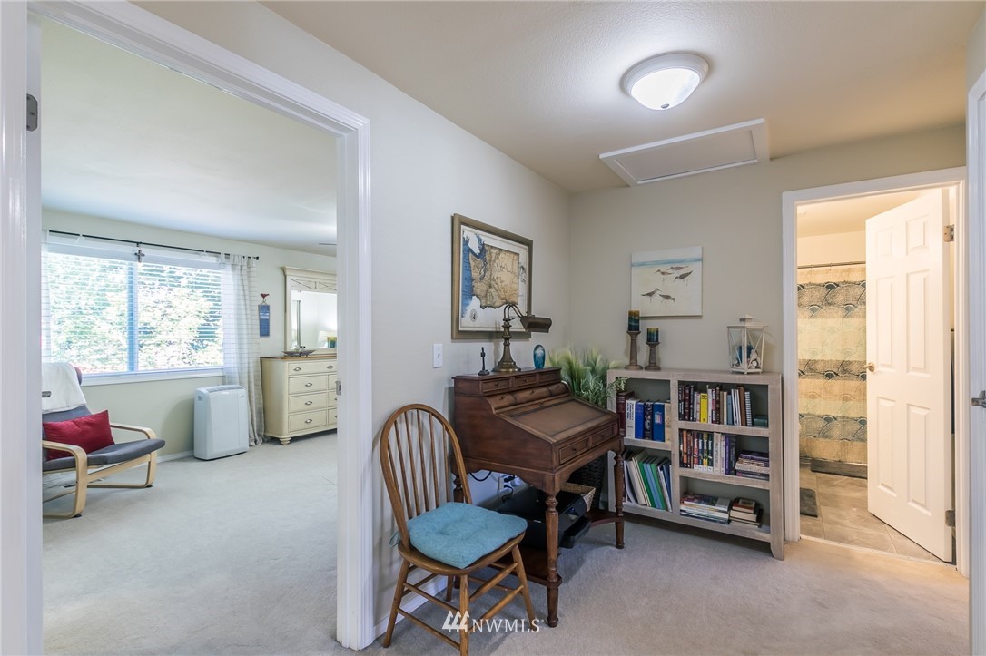 15612 Southeast 178th Street Renton, WA 98058 - Photo 36 of 40 a livingroom with furniture and a window