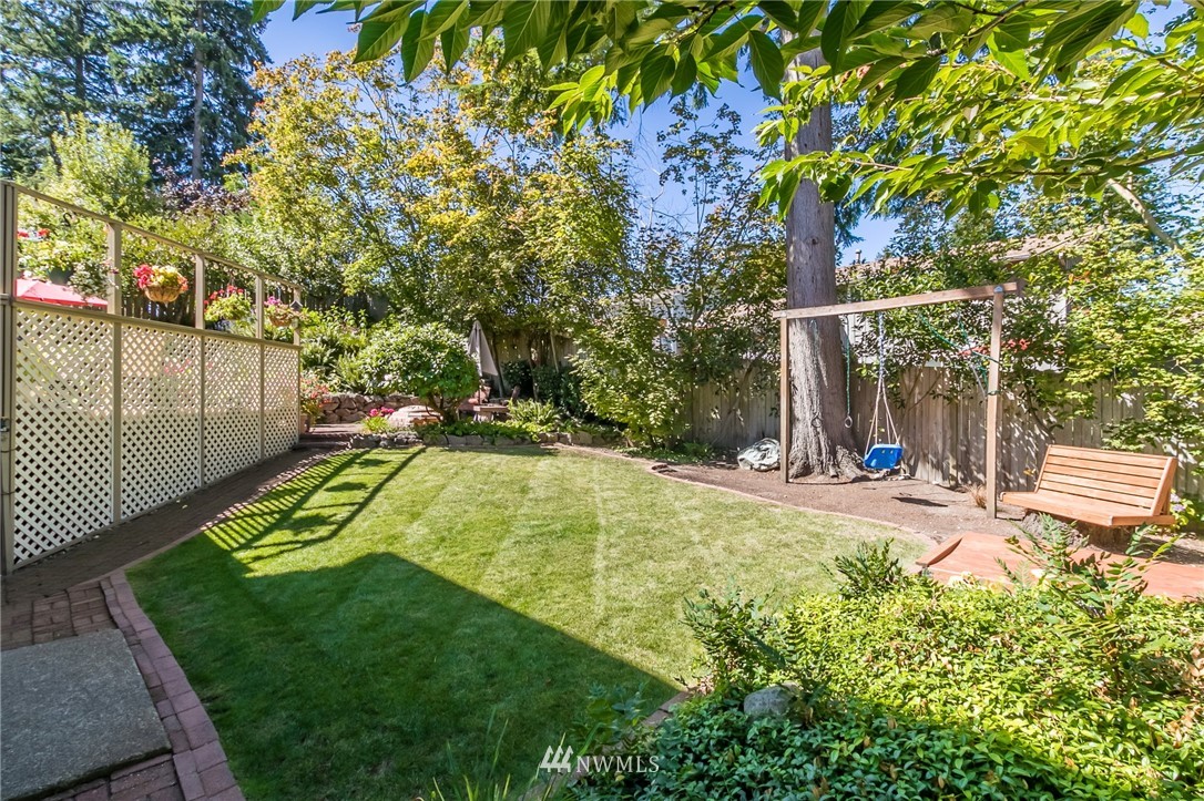 15612 Southeast 178th Street Renton, WA 98058 - Photo 5 of 40 a view of a backyard with swimming pool