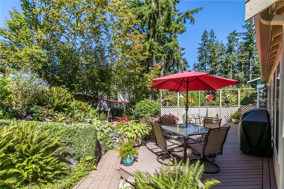 15612 Southeast 178th Street Renton, WA 98058 - Photo 6 of 40 a view of a backyard with sitting area and furniture
