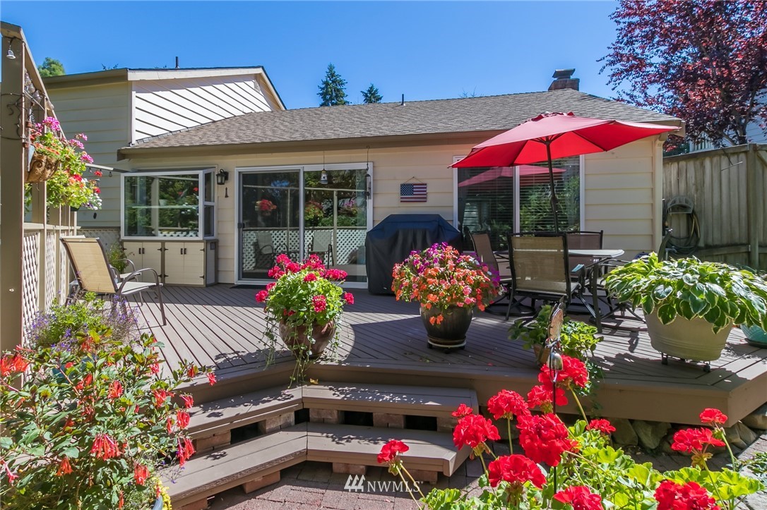 15612 Southeast 178th Street Renton, WA 98058 - Photo 7 of 40 a view of a chairs and table in the patio