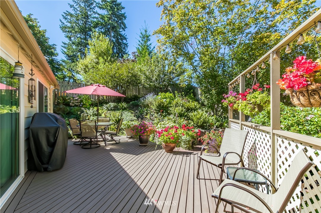 15612 Southeast 178th Street Renton, WA 98058 - Photo 8 of 40 a view of a chairs and table in the balcony