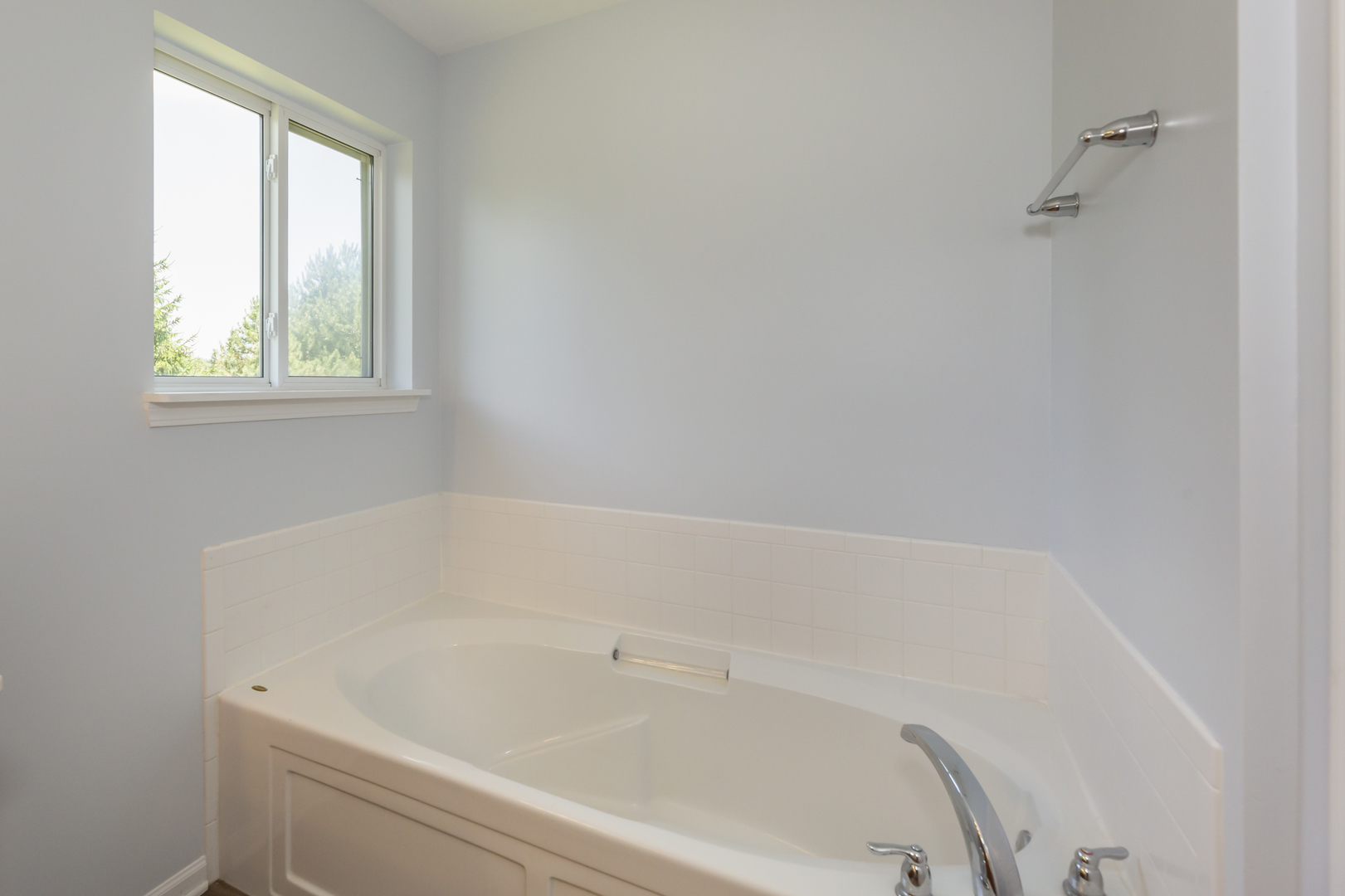 220 Stearn Drive Genoa, IL 60135 - Photo 26 of 42 a white bath tub sitting next to a window