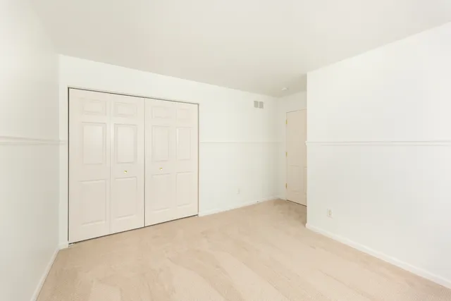 a bathroom with a sink a mirror and a shower