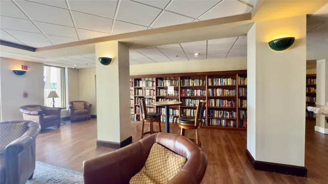 a view of outdoor space with seating area and swimming pool