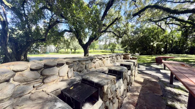 a view of a lake with houses in the back