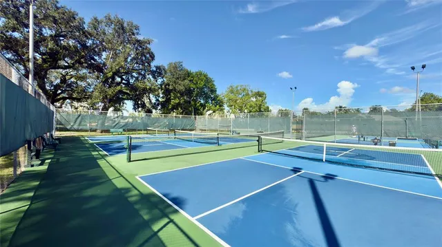 a view of swimming pool with seating area