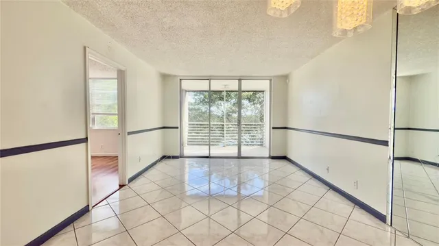 a kitchen with stainless steel appliances a sink a stove and a refrigerator