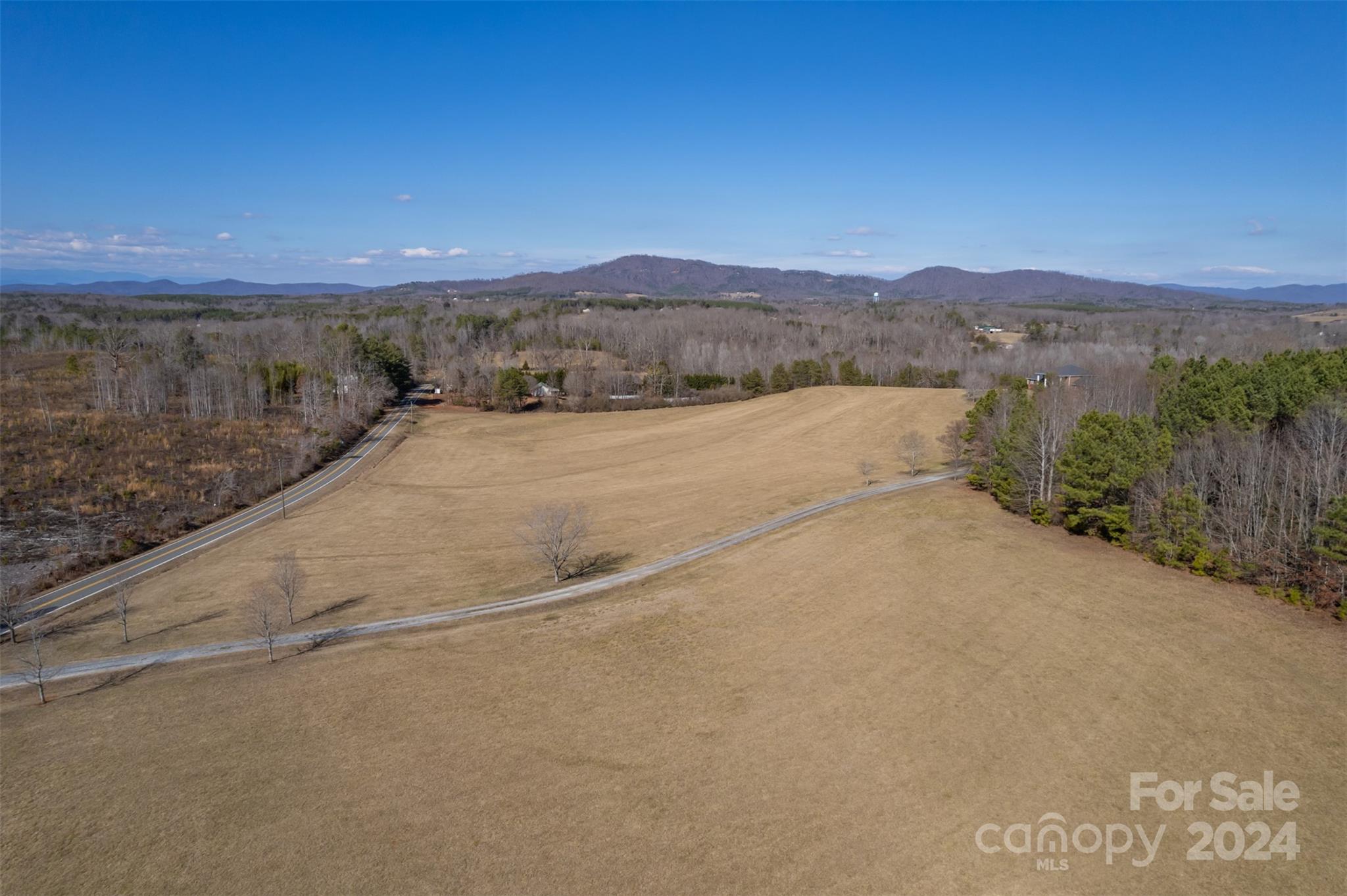370 Depriest Road Bostic, NC 28018 - Photo 3 of 19 a view of a dry car parking space with mountain view