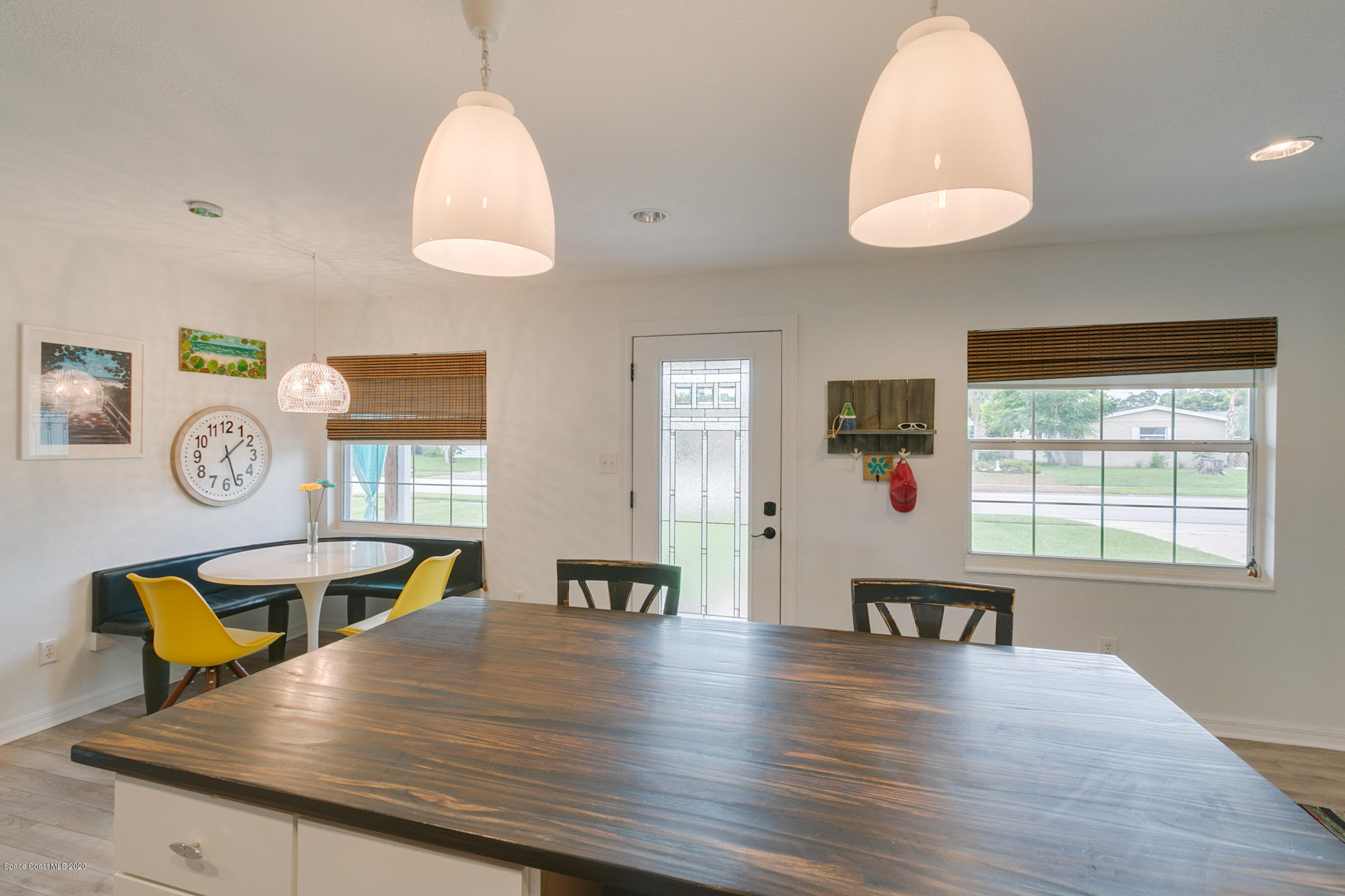 947 Kings Post Road Rockledge, FL 32955 - Photo 14 of 35 Front Door and Kitchen Island