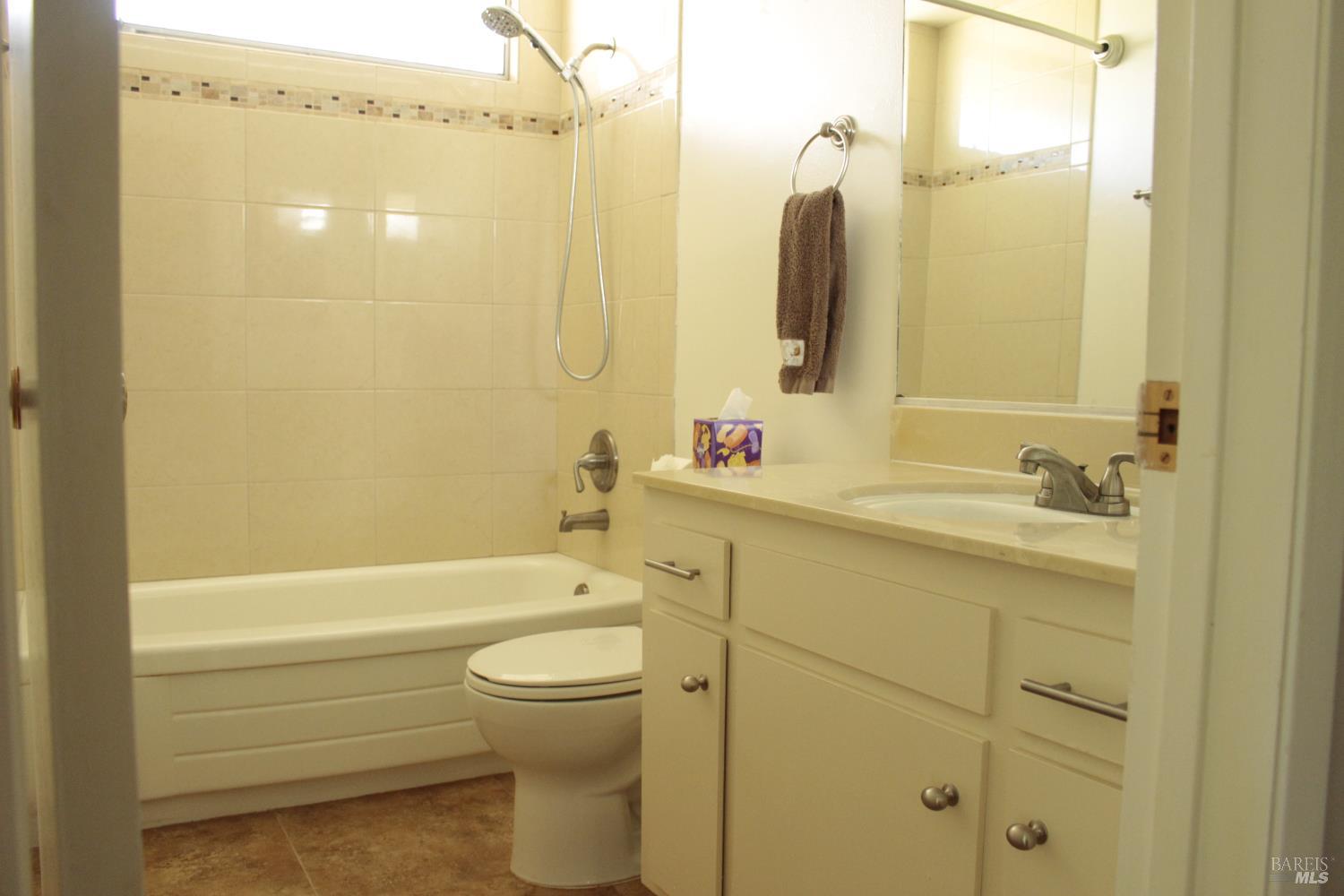 11 Oakgreen Santa Rosa, CA 95409 - Photo 27 of 37 a bathroom with a sink a toilet and shower