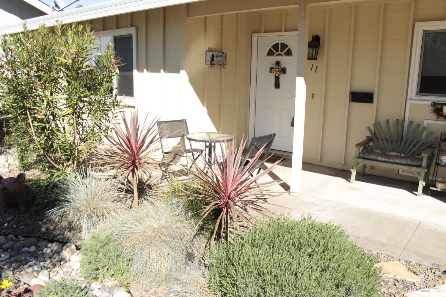 11 Oakgreen Santa Rosa, CA 95409 - Photo 3 of 37 a bedroom with a bed and a flat screen tv
