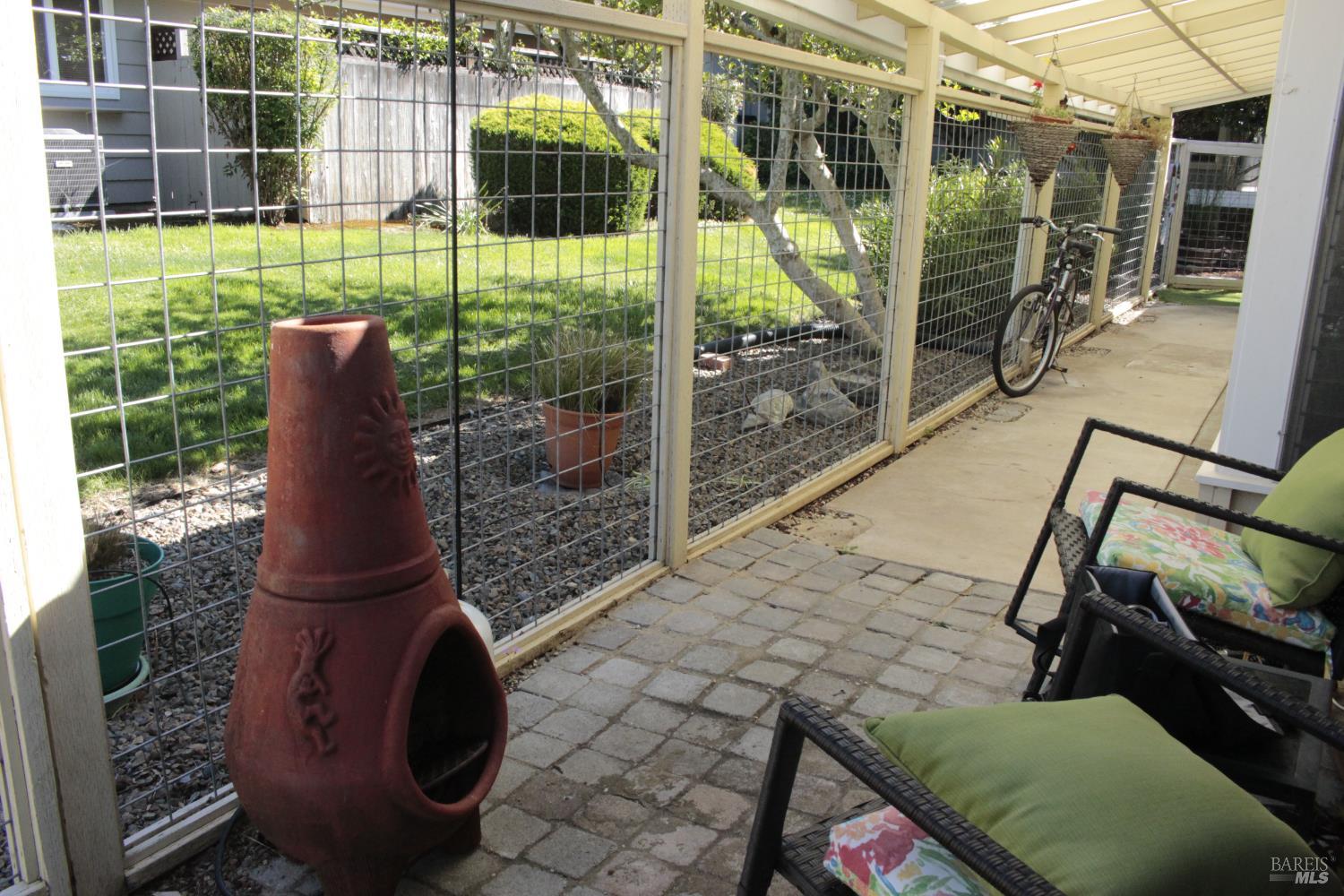 11 Oakgreen Santa Rosa, CA 95409 - Photo 34 of 37 a backyard of a house with outdoor seating