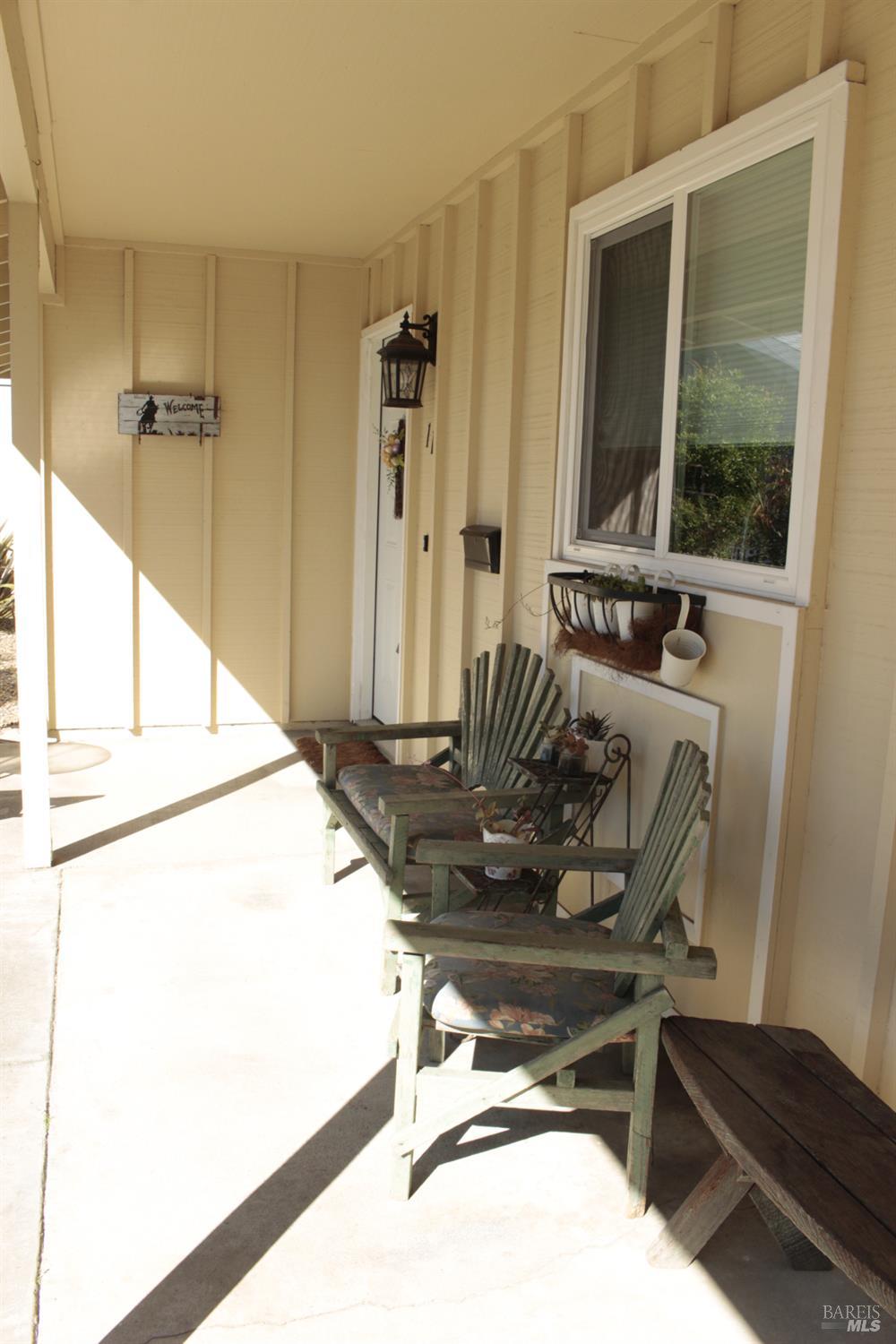 11 Oakgreen Santa Rosa, CA 95409 - Photo 6 of 37 a room with table chairs and windows