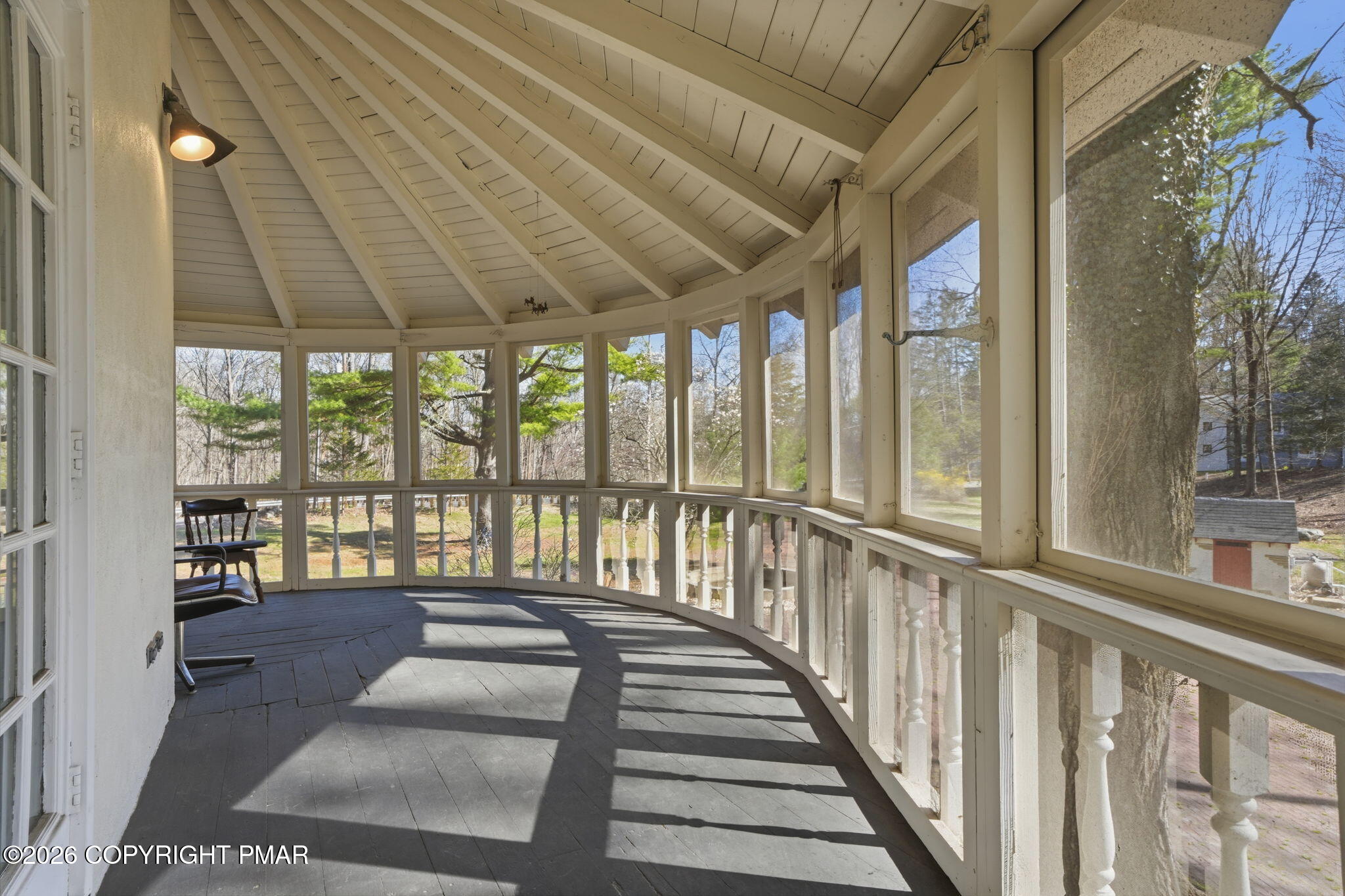 720 Stokes Mill Road East Stroudsburg, PA 18301 - Photo 17 of 87 a view of a porch with wooden floor and outdoor space