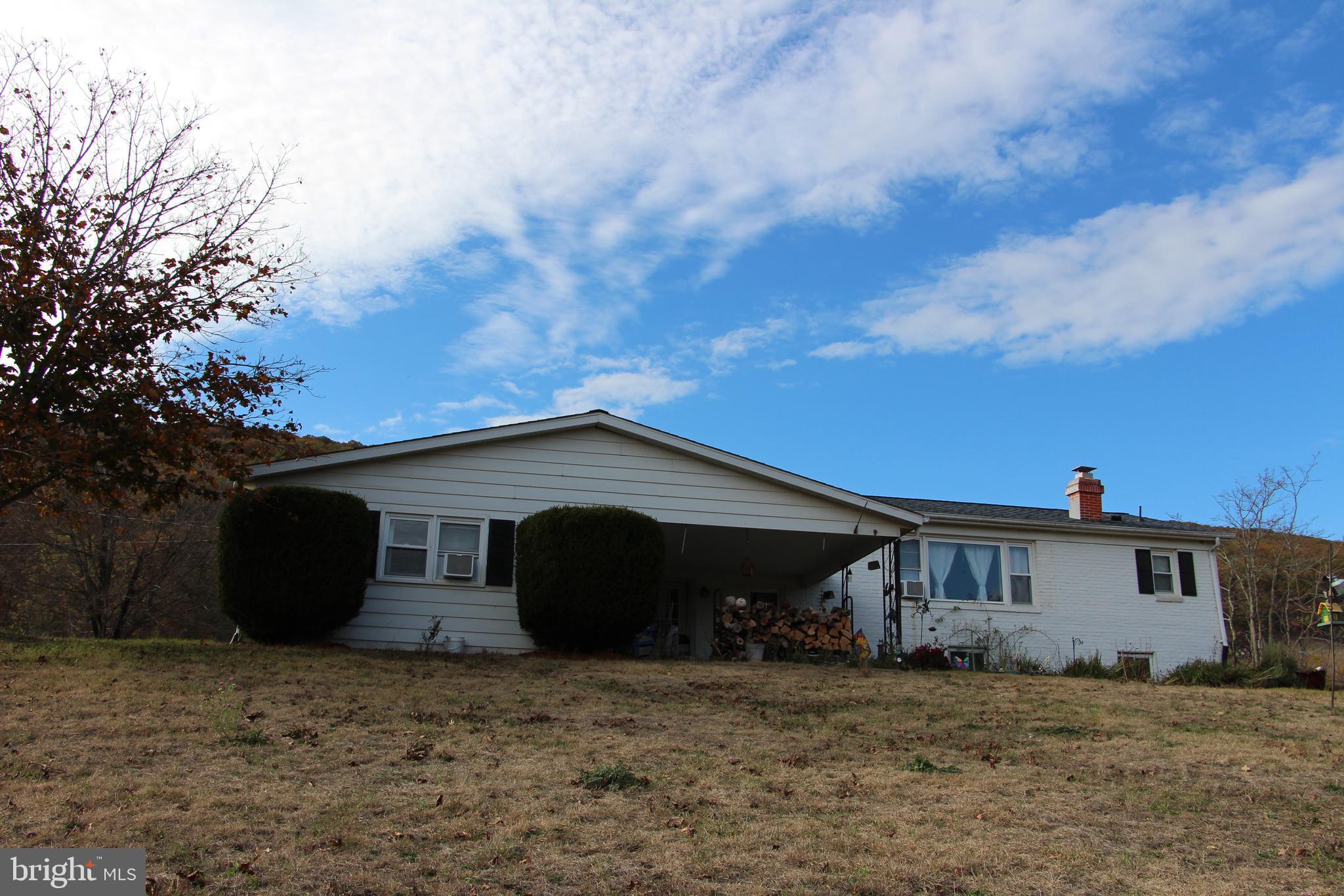 775 Corners Road Cabins, WV 26855 - Photo 2 of 20 a view of a house with a yard