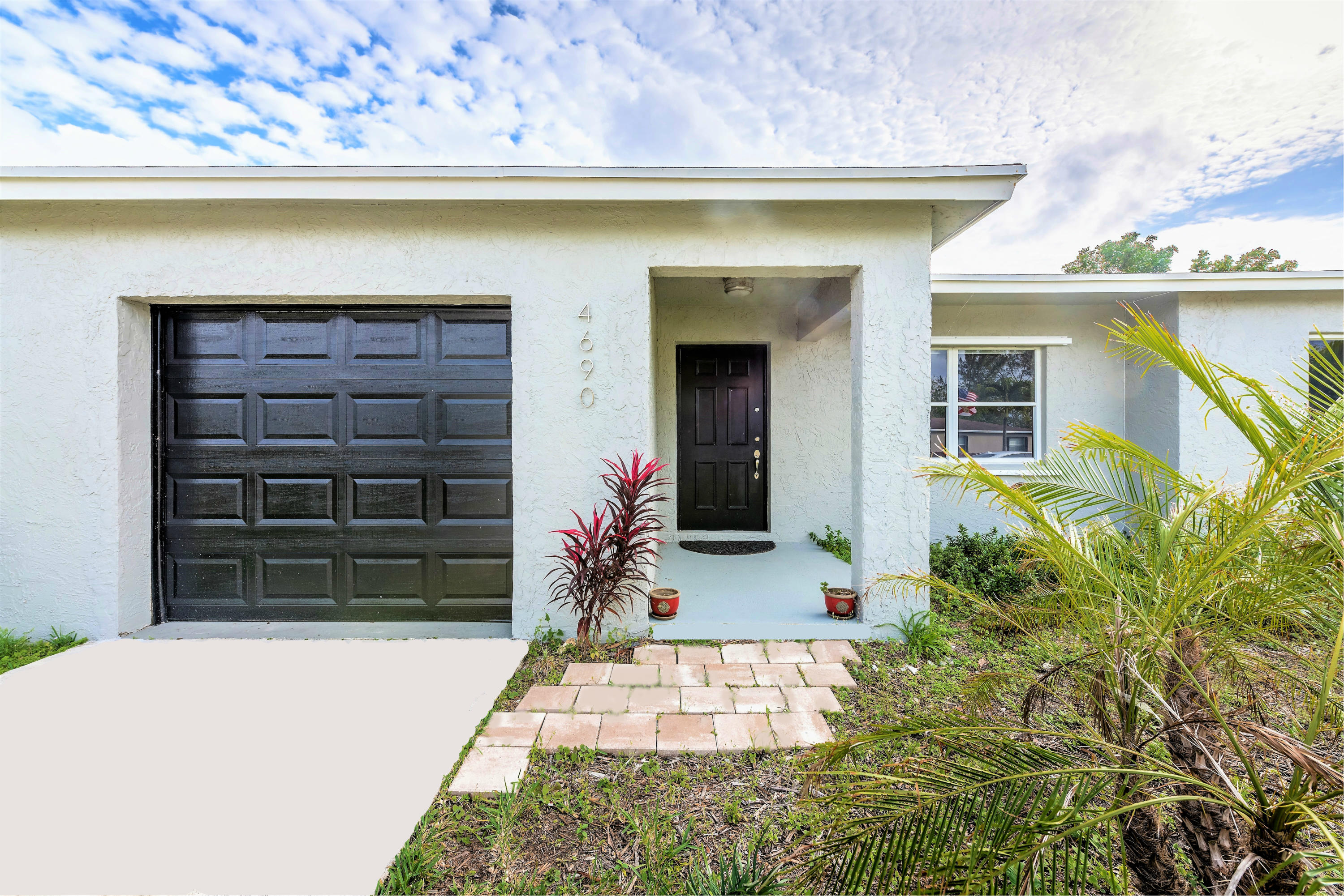 4690 Baldric Street Boca Raton, FL 33428 - Photo 4 of 25 entrance