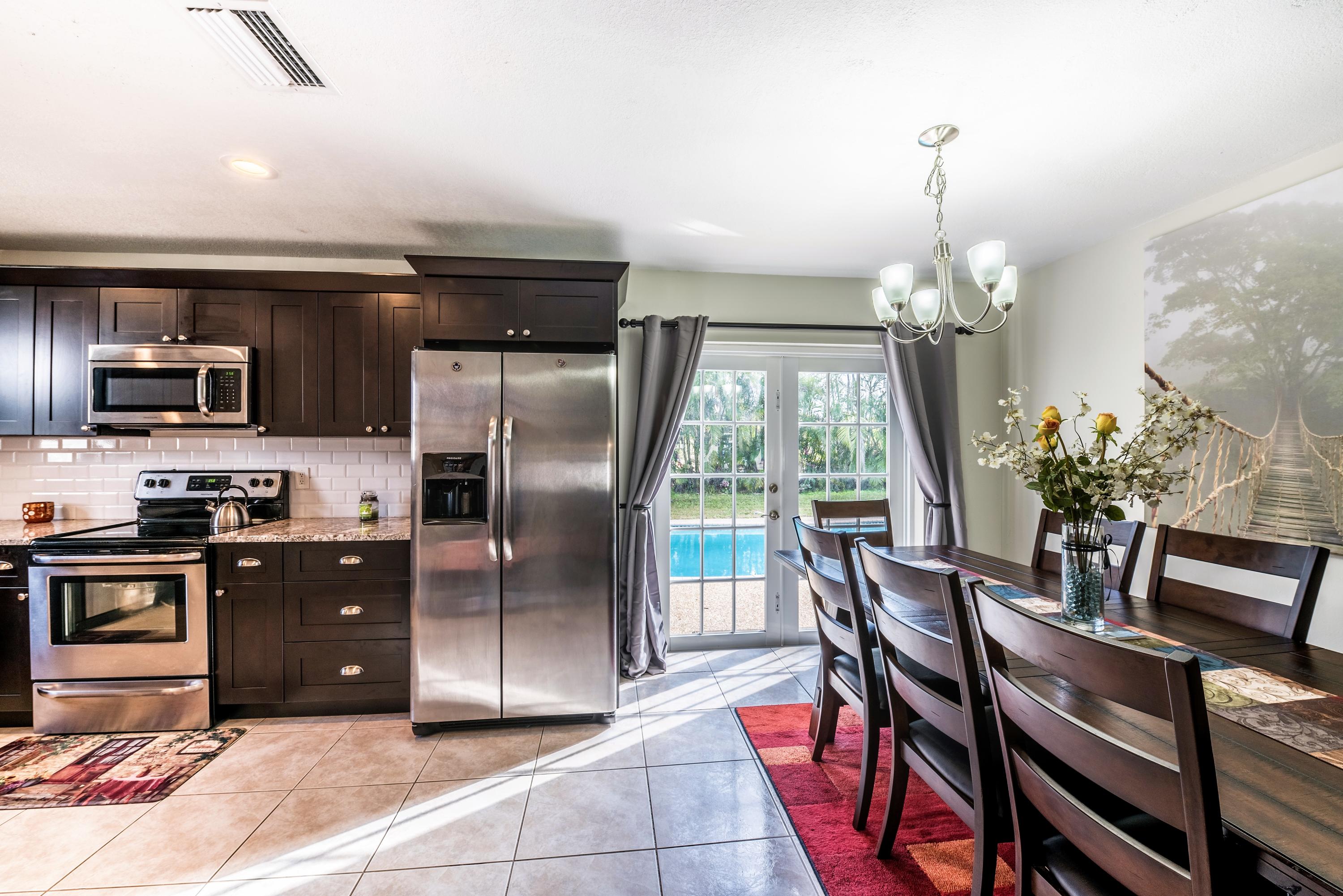 4690 Baldric Street Boca Raton, FL 33428 - Photo 8 of 25 dining room/kitchen