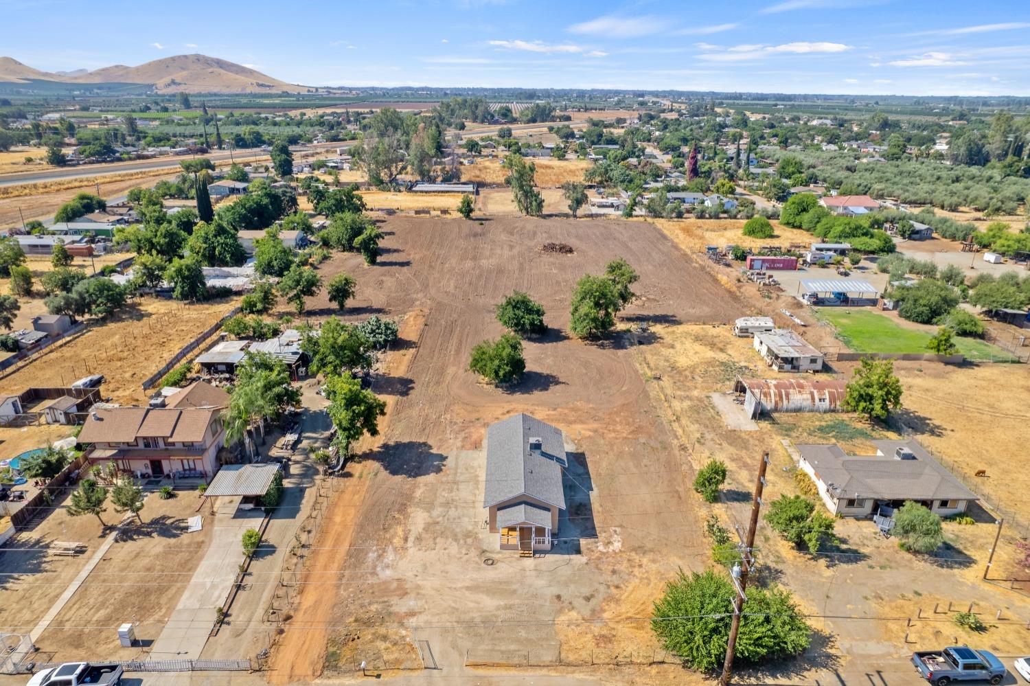 23375 Ave 196 Strathmore, CA 93267 - Photo 31 of 31 an aerial view of residential houses with outdoor space
