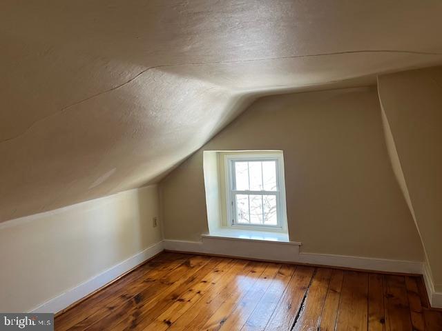 3200 Main Street, Unit 1 Morgantown, PA 19543 - Photo 9 of 9 an empty room with wooden floor and windows