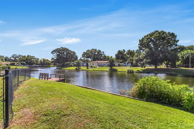 $574,999 | 4864 Lake Charles Drive North, Kenneth City, FL 33709