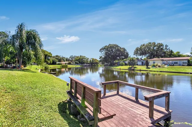 $574,999 | 4864 Lake Charles Drive North, Kenneth City, FL 33709