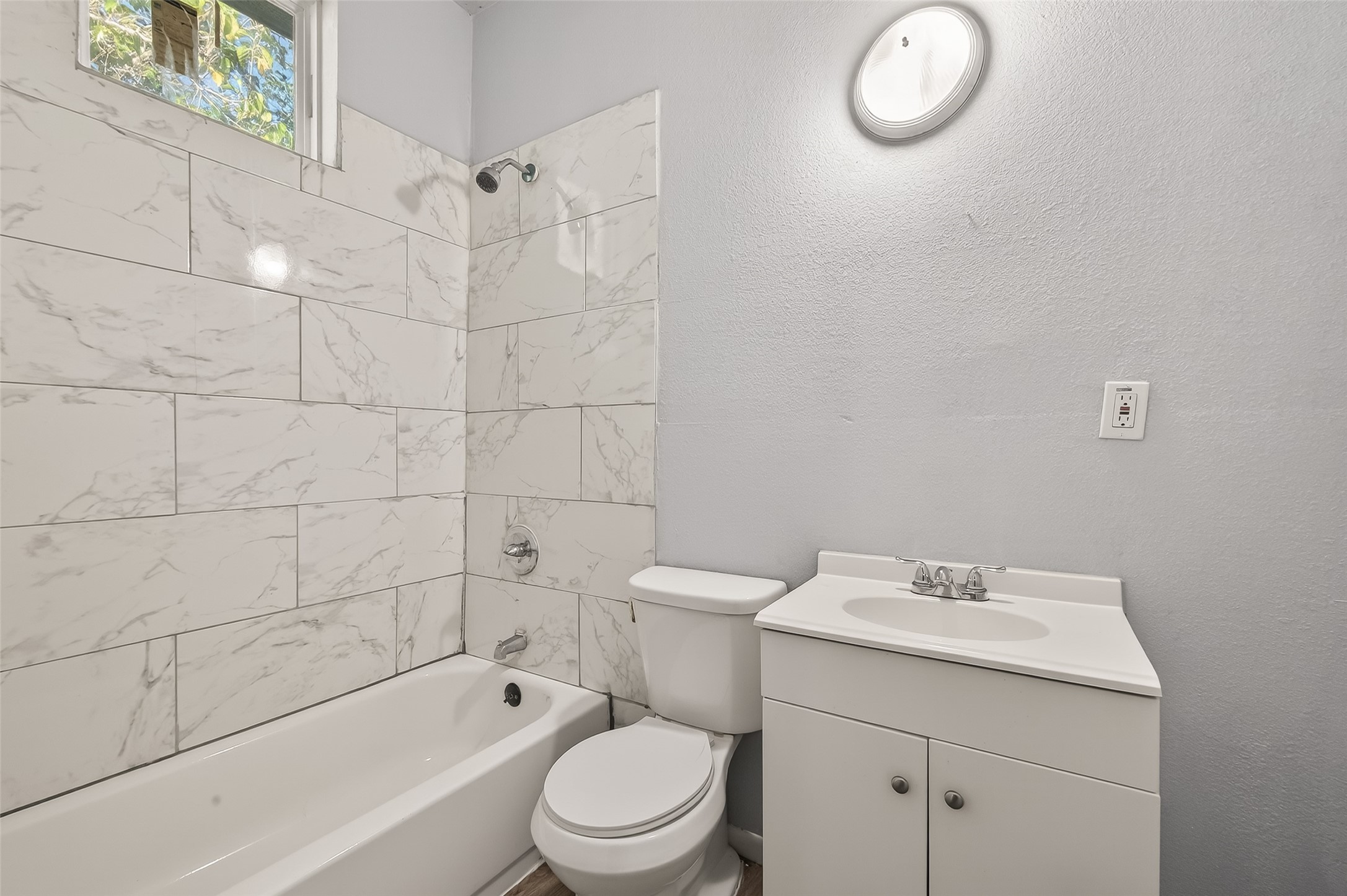 8211 Parnell Street Houston, TX 77051 - Photo 7 of 22 a bathroom with a sink toilet and shower