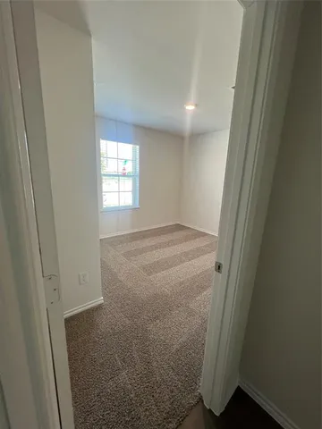 a view of hallway with window