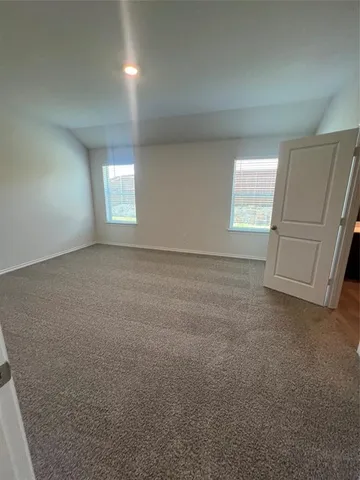 a view of house with yard