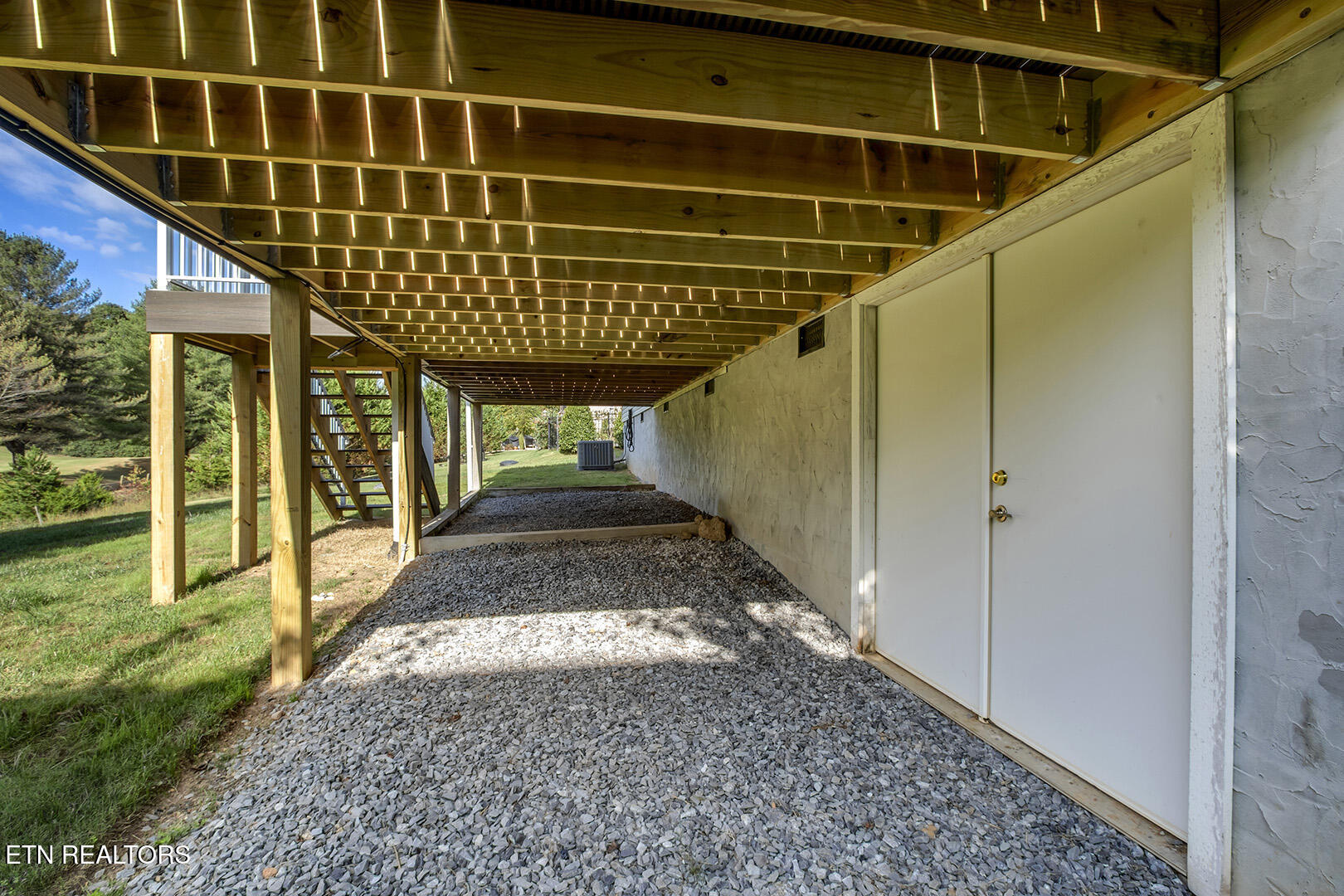 134 Daleyuhski Way Loudon, TN 37774 - Photo 42 of 54 42_DaleyuhskiWay_134_UnderDeck-PorchSpac