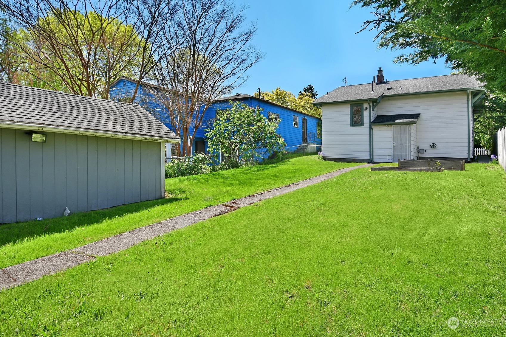 9448 18th Avenue Southwest Seattle, WA 98106 - Photo 17 of 20 a house view with a garden space
