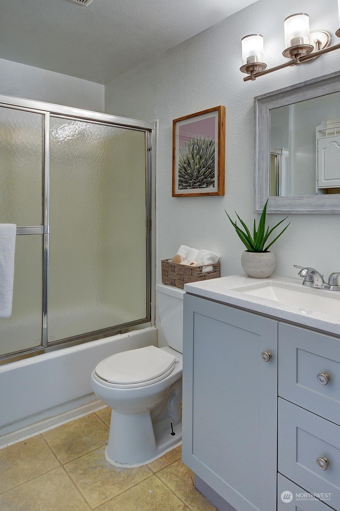 9448 18th Avenue Southwest Seattle, WA 98106 - Photo 8 of 20 a bathroom with a sink toilet and shower