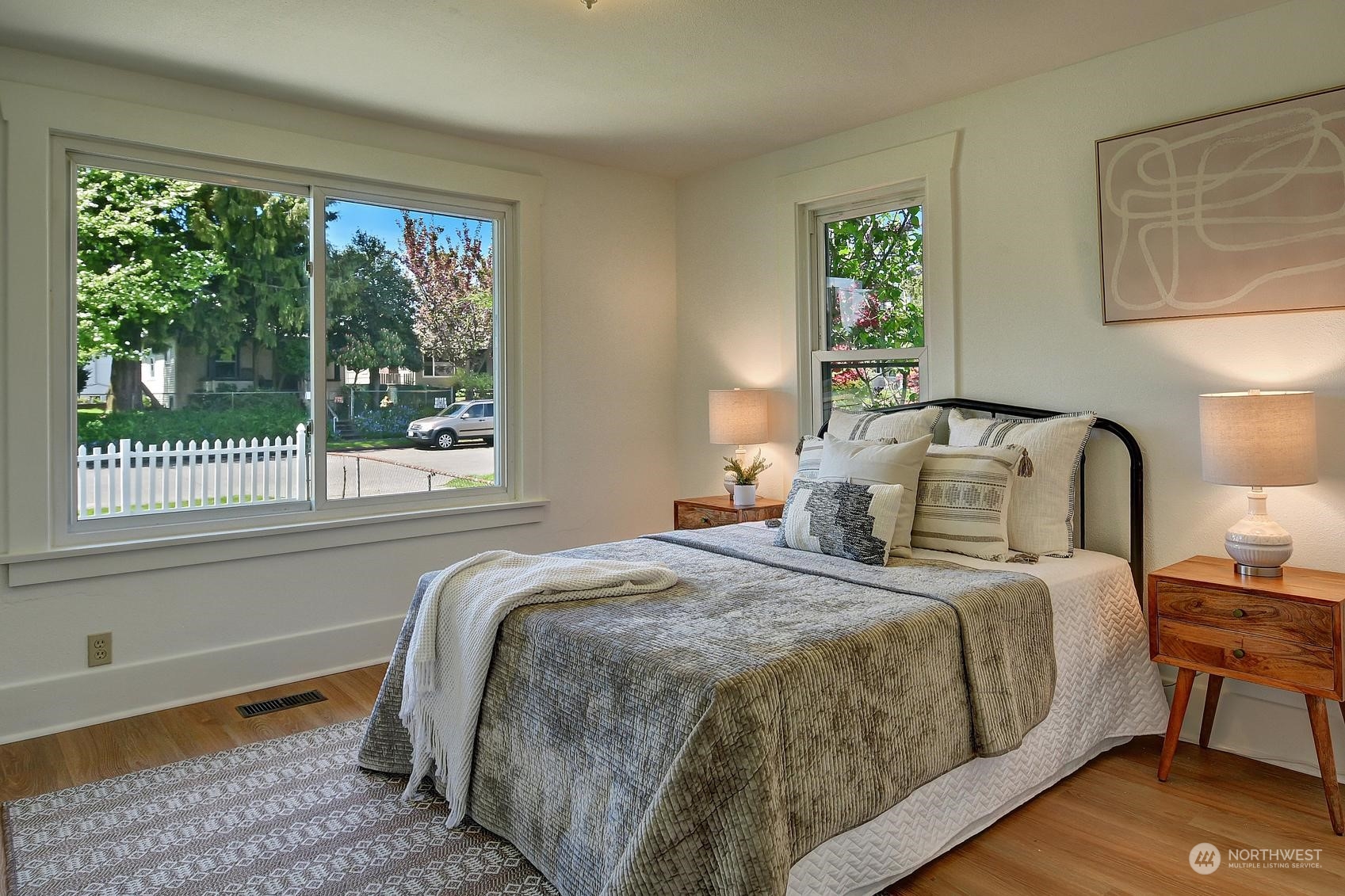 9448 18th Avenue Southwest Seattle, WA 98106 - Photo 9 of 20 a bedroom with a bed and a window