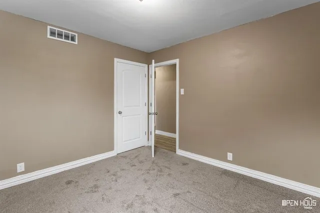 an empty room with an entryway
