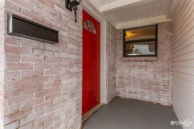 a brick house with a door