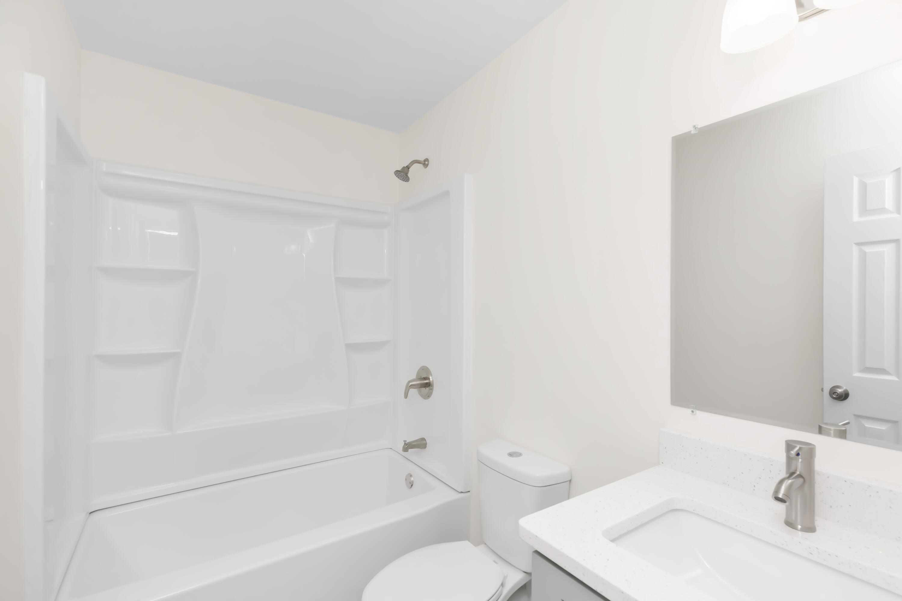 105 Beacons Bend Road Crestview, FL 32536 - Photo 32 of 52 a bathroom with a bathtub shower sink vanity and toilet