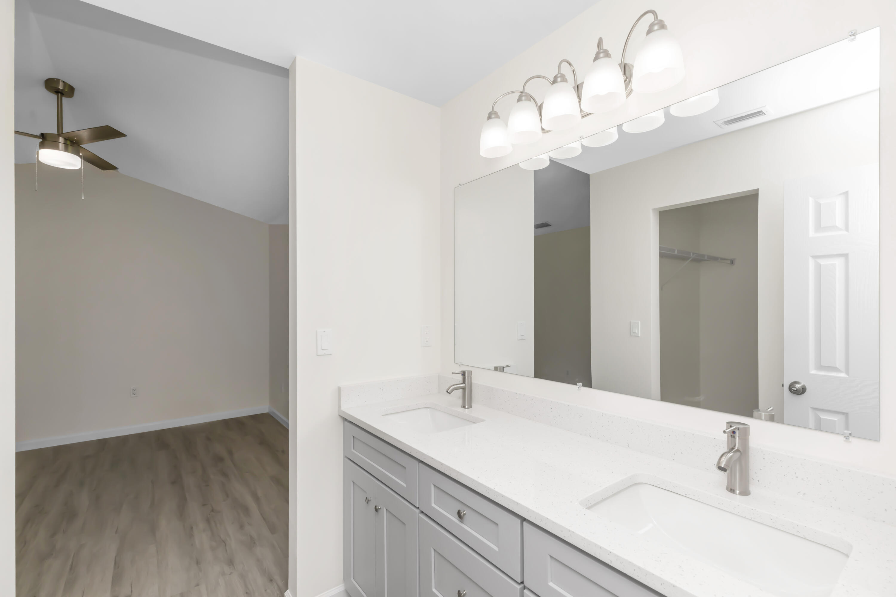 105 Beacons Bend Road Crestview, FL 32536 - Photo 44 of 52 a bathroom with a sink and a mirror