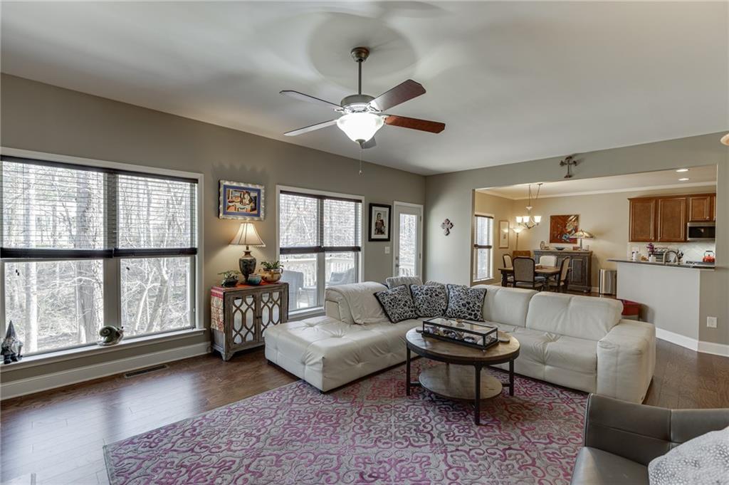 2201 Spring Sound Lane Buford, GA 30519 - Photo 13 of 66 a living room with furniture and a large window