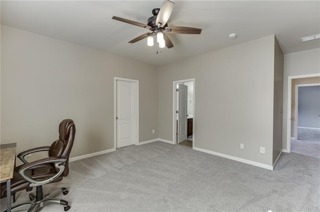 2201 Spring Sound Lane Buford, GA 30519 - Photo 26 of 66 a view of room with workspace and windows